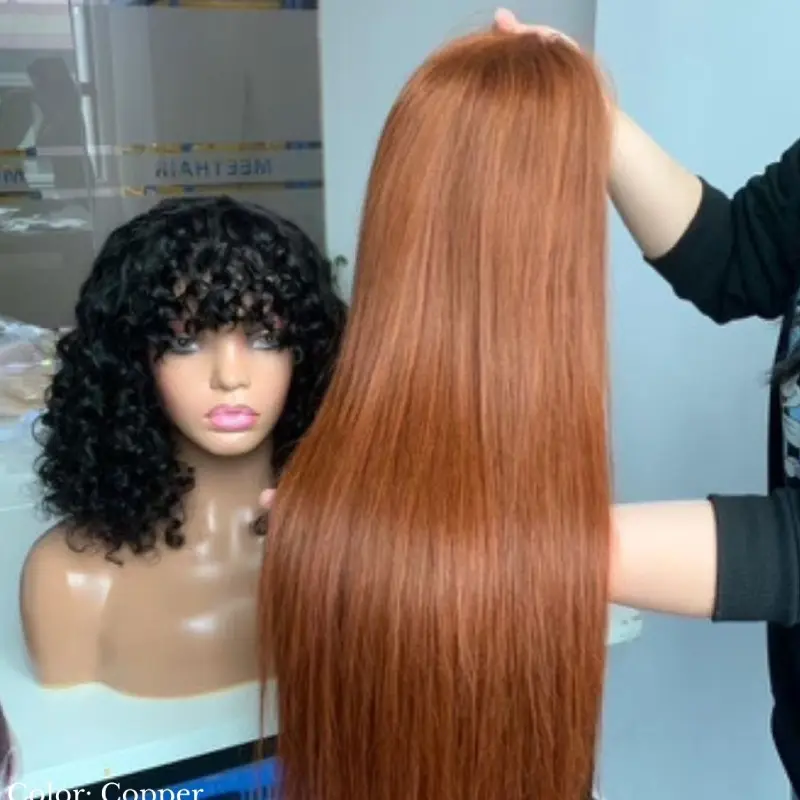 A woman is standing in front of two wigs.